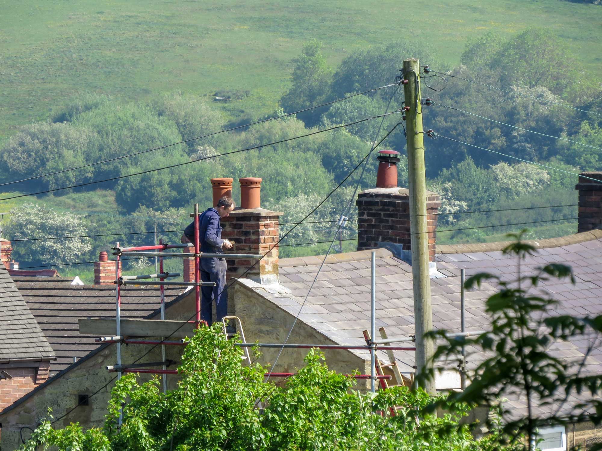 Worker fixing roof